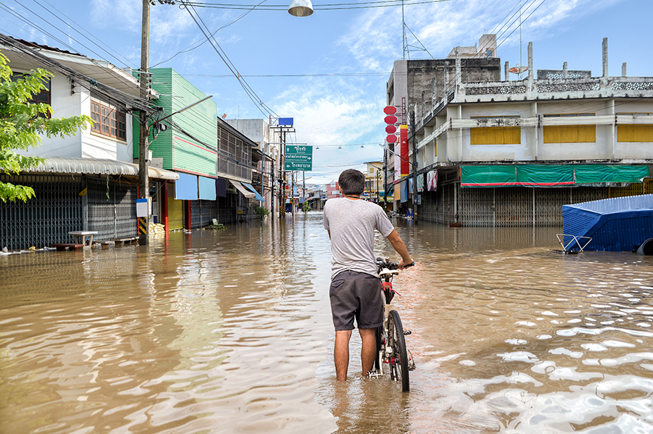 A flooded road due to heavy rain somewhere in Thailand. ISTOCK / GETTY IMAGES PLUS