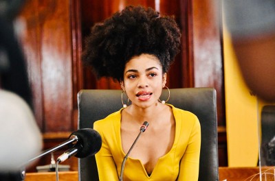 Still of Zulaikha Patel speaking about social justice before the former Deputy Minister of the Presidency at the South African Union Building in Pretoria. © IG @zulaikhapatel