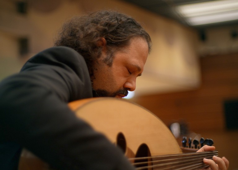 Wassim Mukdad plays the oud during a recent UN Torture Fund Meeting