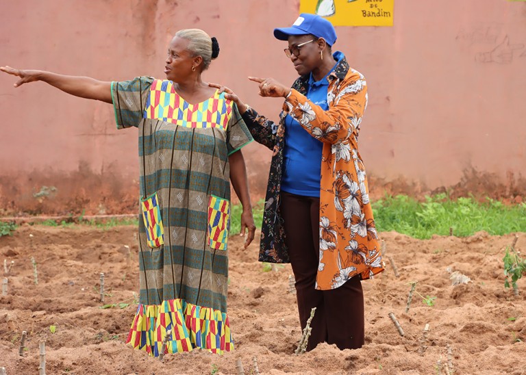 Aminata Kebe, Coordinator of the PAPEV project and Georgina Da Silva responsible for the management of the AMIC centre for the reception of young girls visiting the market garden. ©OHCHR WARO Habibou