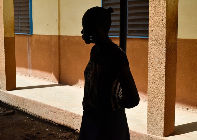 A young woman, who escaped a forced marriage, is seen at the Catholic nuns' shelter, Sainte Maria Goretti, where she now lives in Kaya, Burkina Faso, February 23, 2022.  © REUTERS/Anne Mimault