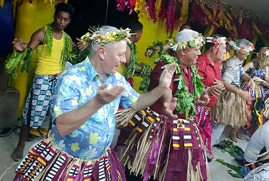 Special Rapporteur for Climate Change Ian Fry, who holds Tuvaluan and Australian nationality, performing a traditional dance. 