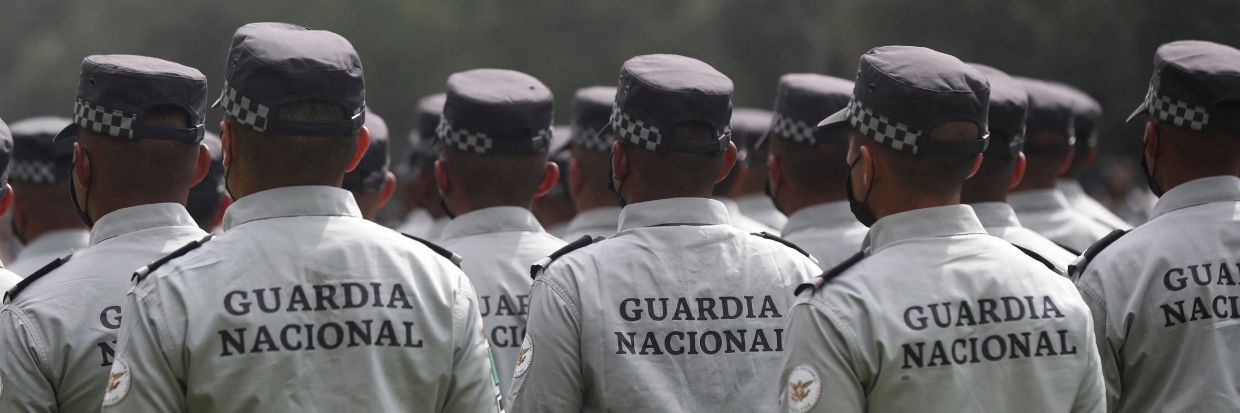 عناصر من الحرس الوطني خلال الحفل الرسمي لإطلاق القوة الخاصة للرد والتدخل، التي تم إنشاؤها مؤخّرًا في مكسيكو سيتي بالمكسيك، في 16 آب/ أغسطس 2022 © رويترز