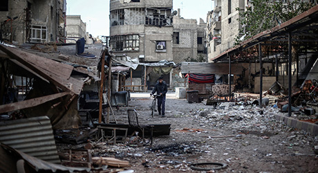 Destroyed buildings in Douma, a city just outside Damascus, Syria. © Credit EPA/MOHAMMED BADRA