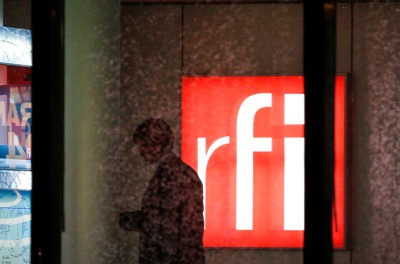 A man walks inside the RFI (Radio France International)  France 24 headquarters in Issy-Les-Moulineaux, near Paris, France.