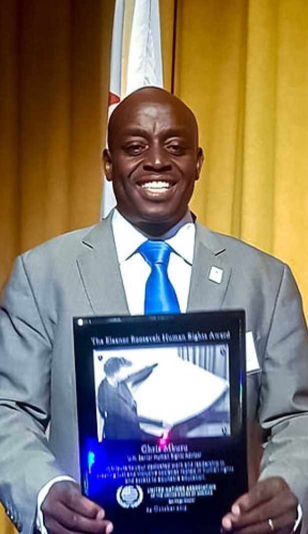 Man holding award