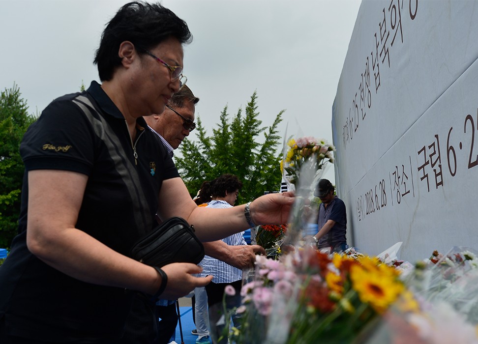 تجمّع للأسر في يوم إحياء ذكرى المختطفين في سياق الحرب الكورية © المفوضية السامية لحقوق الإنسان 