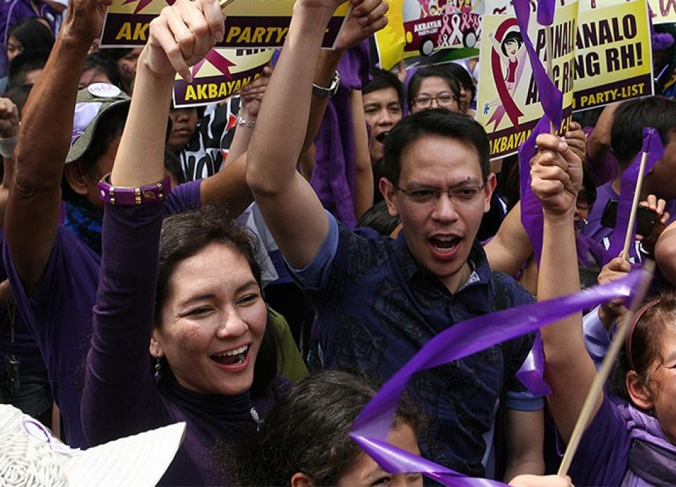 Men and women in purple at protest