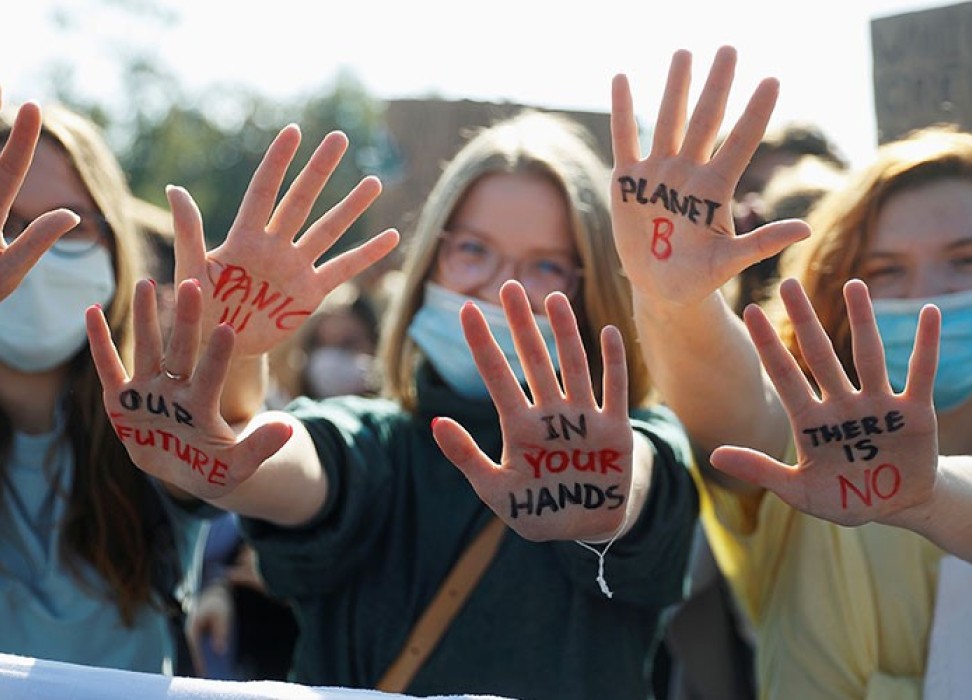 Children protesting with painted hands