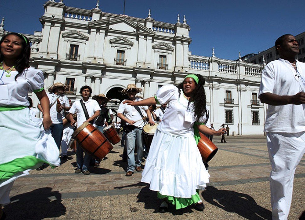 Afro-Chileans dancing and playing music