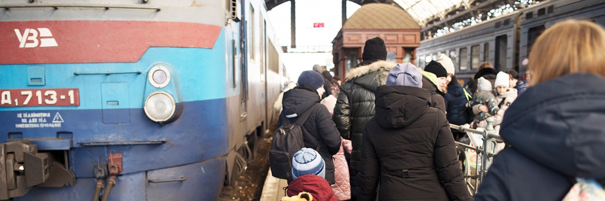 Ukrainians wait for trains to leave the country