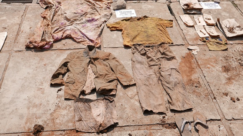 Evidence collected for forensic analysis: Belongings of the victims excavated from a mass gravesite by the Technical Assistance Team in Tshisuku (Kazumba territory), Kasai Central province, DR Congo, June 2019. © MONUSCO/UN Joint Human Rights Office