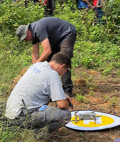 The Technical Assistance Team exploring a potential mass gravesite with drones in Nganza, Kananga, DR Congo, February 2020. © MONUSCO/UN Joint Human Rights Office