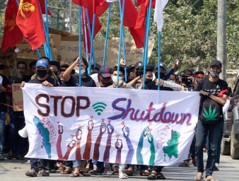 University students hold placards during a protest against the internet shutdown in Sittwe, Rakhine State, western Myanmar.